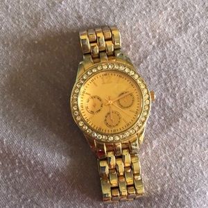 Gold watch with rhinestones